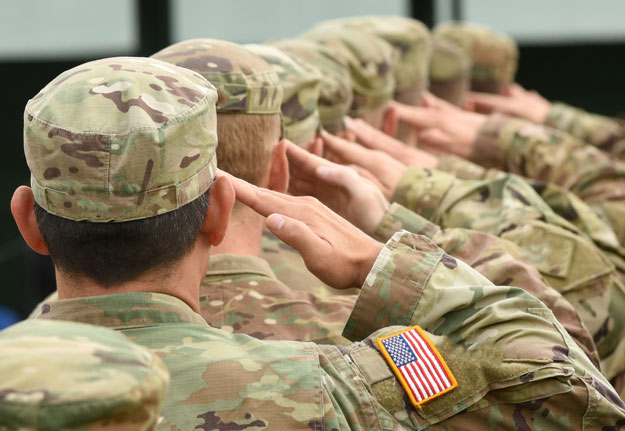 Image of soldiers saluting